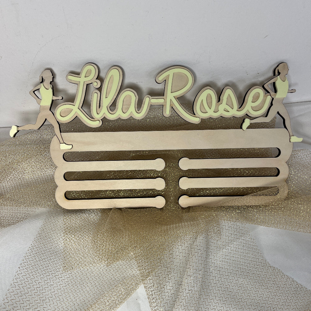 porte medaille running lila rose